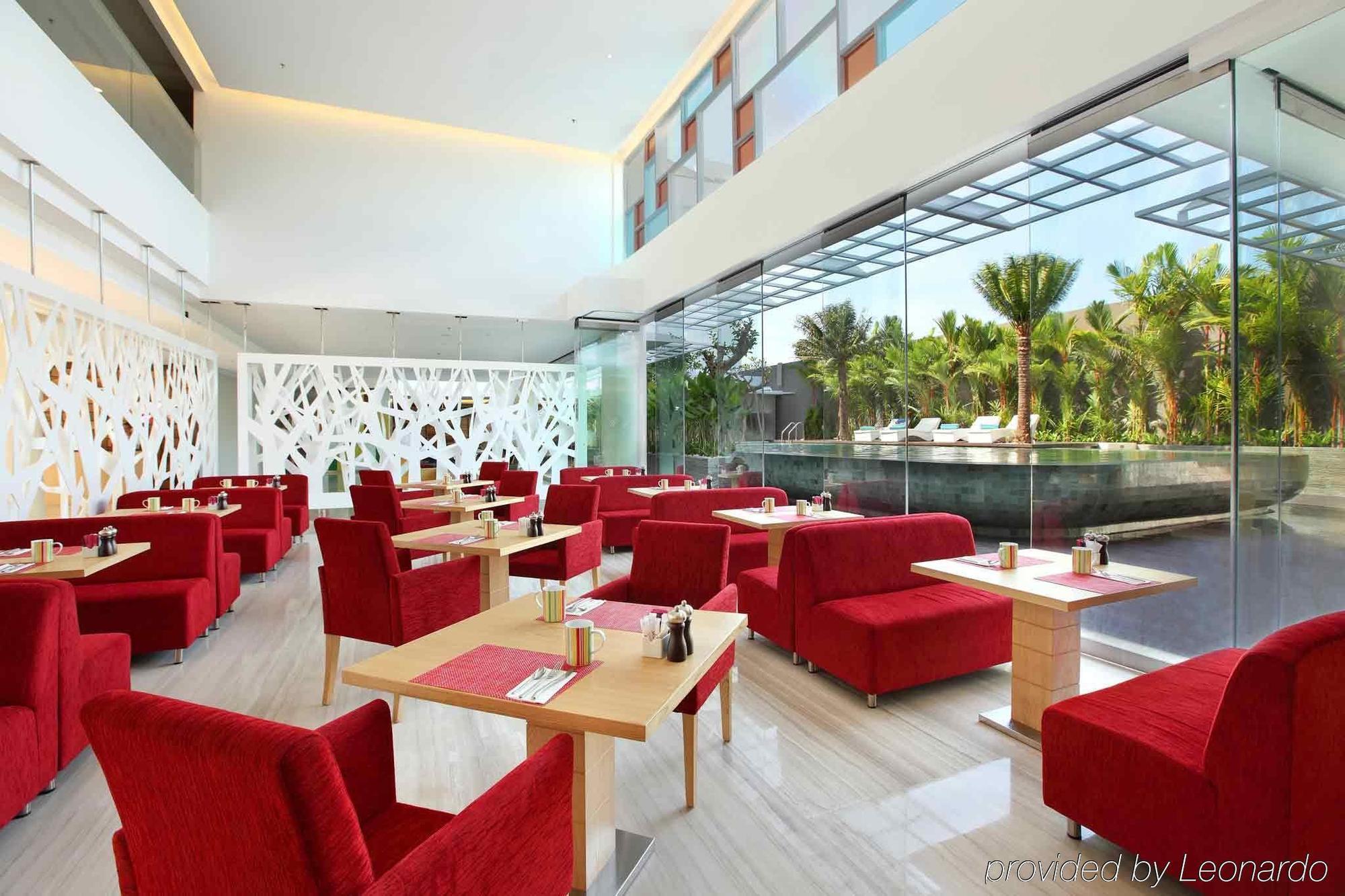 Harvestland Hotel Bali كوتا المطعم الصورة